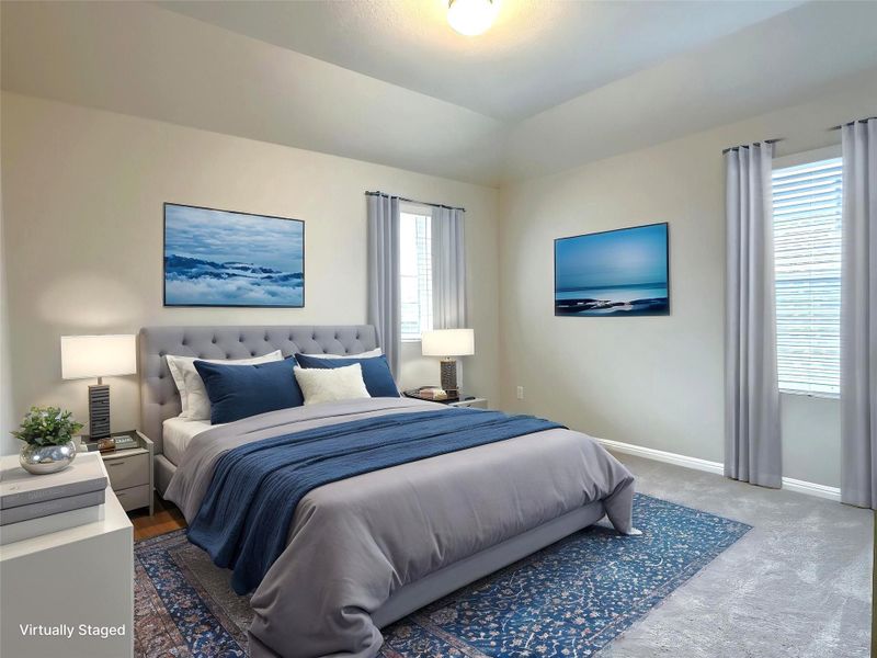 Bedroom 4 with carpet flooring, baseboards, and vaulted ceiling Bedroom 4 with carpet flooring, baseboards, and vaulted ceiling