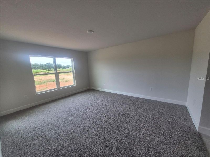 Spacious, unfurnished interior of a new home in Hill Country Estates, Dade City (Image 13).