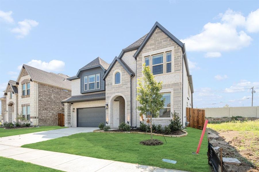 Front exterior of a new home in Ridge Ranch Classic 50, Mesquite, TX, highlighting curb appeal (Image 27). Front exterior of a new home in Ridge Ranch Classic 50, Mesquite, TX, highlighting curb appeal (Image 27).