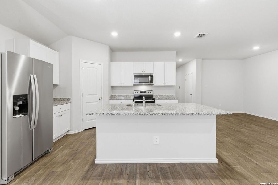 Furnished interior view inside a new home in Arroyo Ranch, Seguin (Image 11).