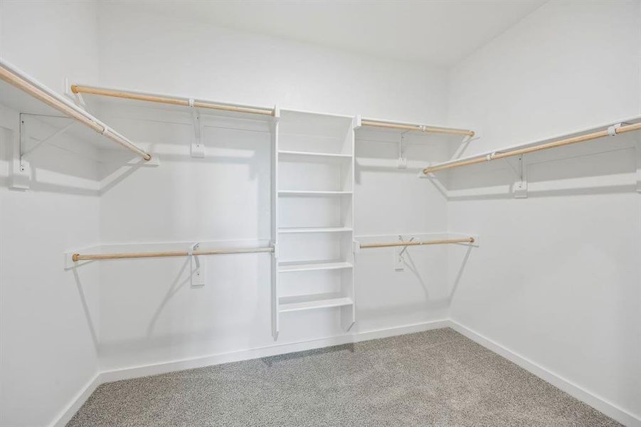 Primary Closet in the Mesquite home plan by Trophy Signature Homes – REPRESENTATIVE PHOTO Primary Closet in the Mesquite home plan by Trophy Signature Homes – REPRESENTATIVE PHOTO