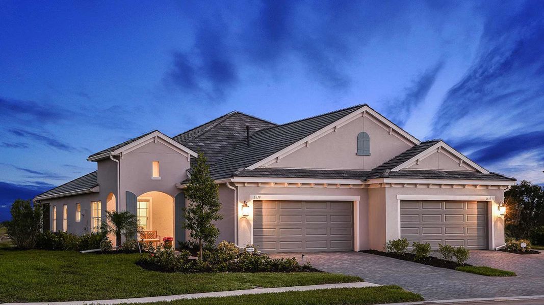 Front exterior of a new home in Windward Real Estate and Homes for Sale in Sarasota, FL - Neal Communities, Sarasota, FL, highlighting curb appeal (Image 17). Front exterior of a new home in Windward Real Estate and Homes for Sale in Sarasota, FL - Neal Communities, Sarasota, FL, highlighting curb appeal (Image 17).