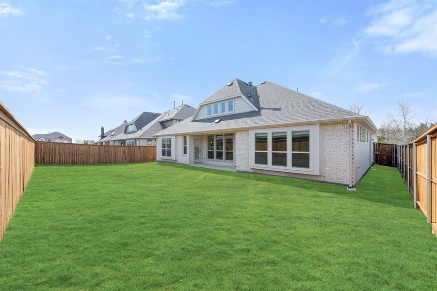 Exterior details and patio area of a home in Terracina, Rockwall (Image 27).