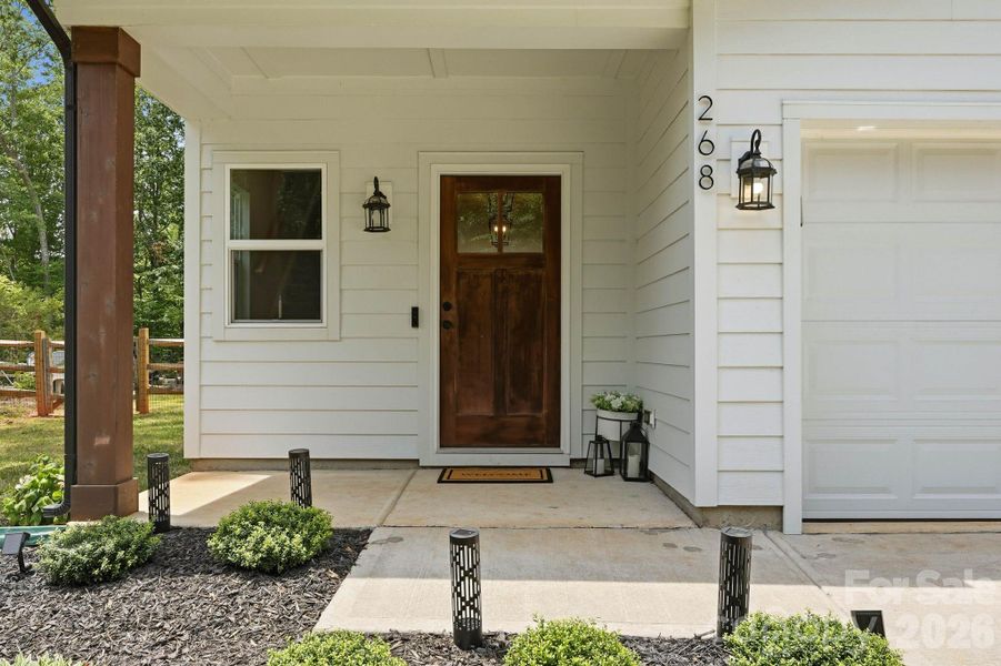 Exterior details and patio area of a home in , Troutman (Image 27).
