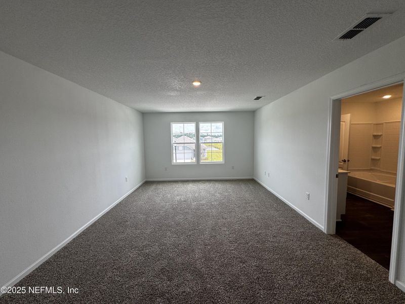 Spacious, unfurnished interior of a new home in The Arbors, Jacksonville (Image 23).