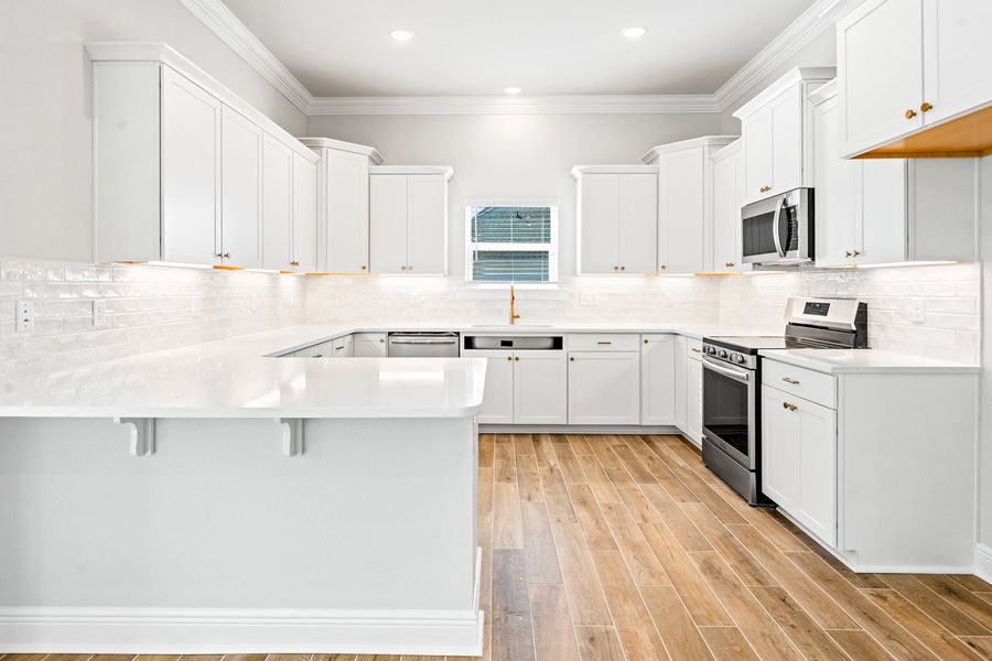 Furnished interior view inside a new home in Natureview, Freeport (Image 6).