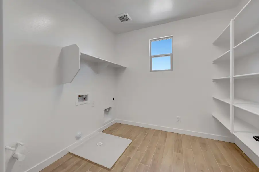 Spacious, unfurnished interior of a new home in Soleo, San Tan Valley (Image 44).