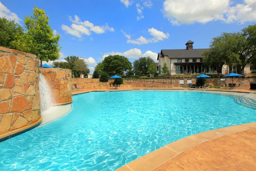 Community pool with a patio area