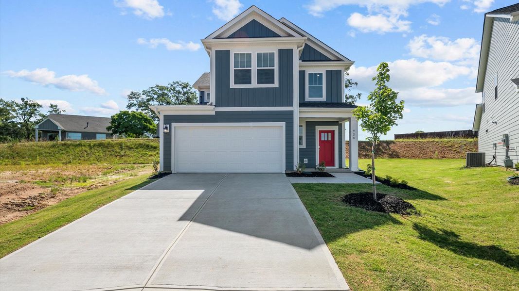 Representative exterior photo of a completed home built from the Freesia by DRB Homes in Spring Branch, Smyrna, TN (Image 24).