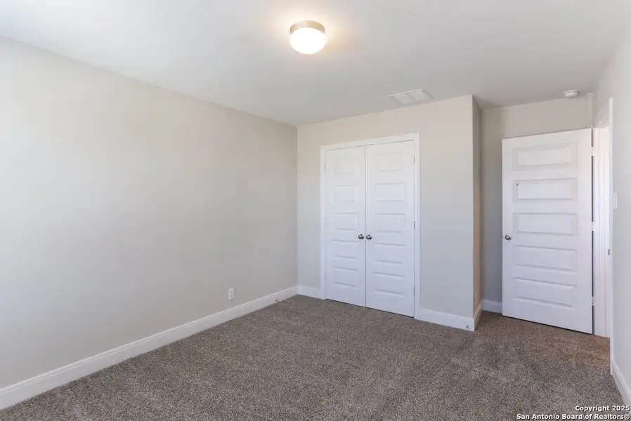 Spacious, unfurnished interior of a new home in Buffalo Crossing – New Phase Now Preselling, Cibolo (Image 9).