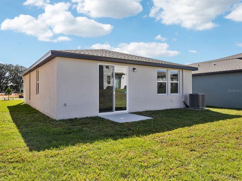 Exterior details and patio area of a home in Benton Hills - Premier Series, Brooksville (Image 3).