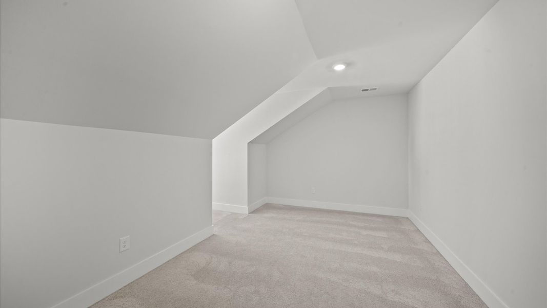 First-rate carpeted loft providing flexible living space for every lifestyle