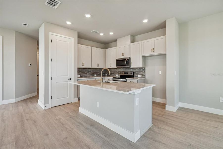 Furnished interior view inside a new home in North River Ranch – Townhomes, Parrish (Image 12).