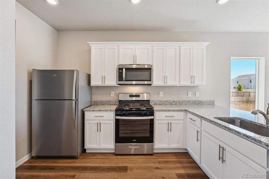 Furnished interior view inside a new home in Cottonwood Greens, Fort Lupton (Image 5).