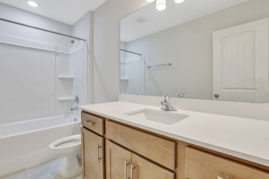 Representative furnished interior of a home built from the The Brookhaven by Smith Family Homes in Ramsey Landing, Rincon (Image 17).