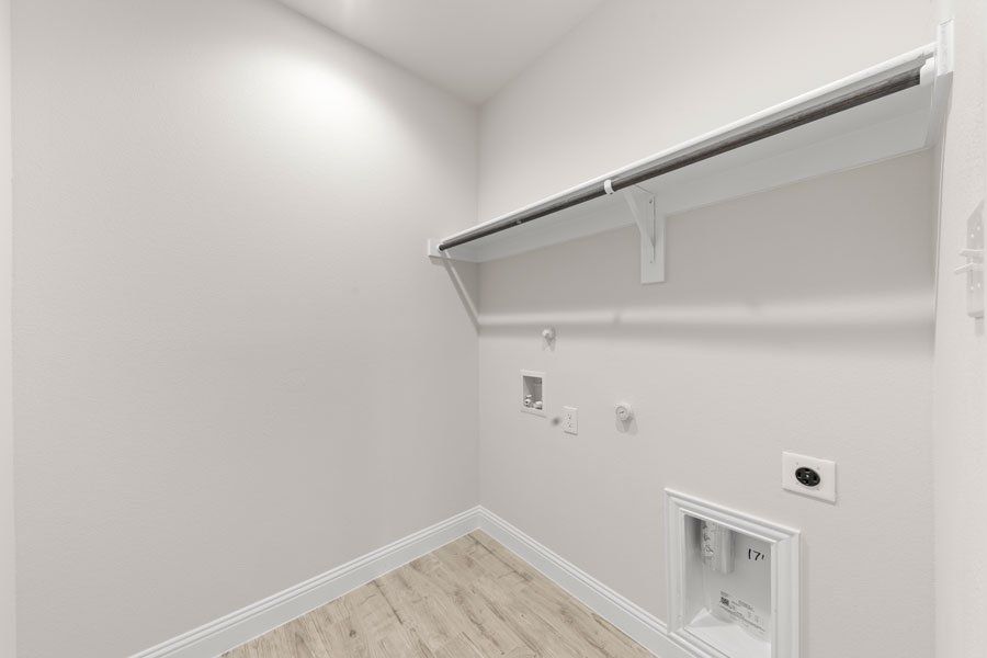 Representative exterior photo of a completed home built from the Kingston by Impression Homes in Timberbrook, Justin, TX (Image 26).