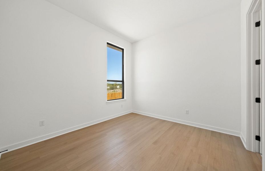 Spacious, unfurnished interior of a new home in 6 Creeks, Kyle (Image 52).