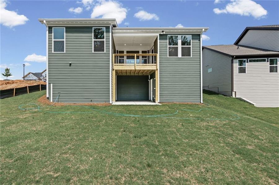 Exterior details and patio area of a home in Twin Lakes, Hoschton (Image 31).
