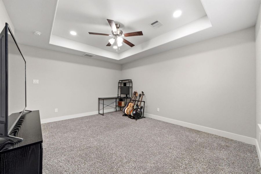 Neutral finishes create the perfect canvas to make this primary suite your own.