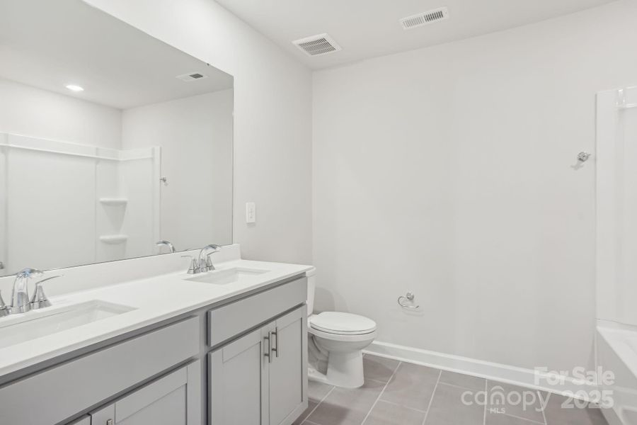 Photo is not of the actual home, but is an inspirational photo of builder’s model home and may depict options, furnishings, and/or decorator features that are not included Photo is not of the actual home, but is an inspirational photo of builder’s model home and may depict options, furnishings, and/or decorator features that are not included