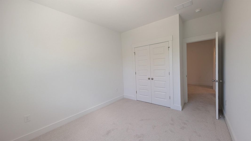 Spacious, unfurnished interior of a new home in Long Bay Golf Club, Longs (Image 32).