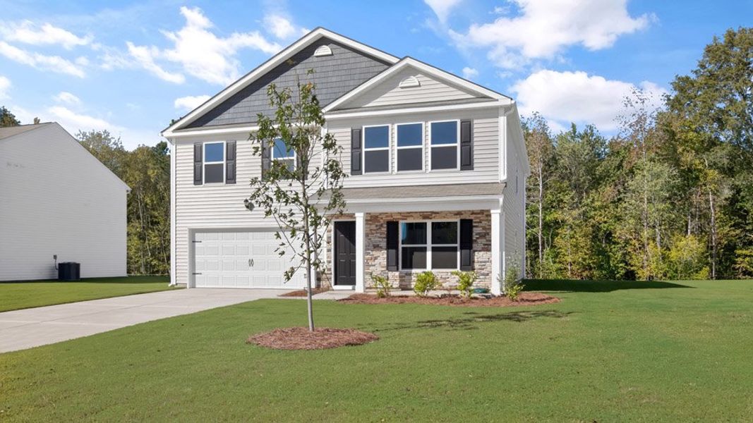 Representative exterior photo of a completed home built from the KYLE by D.R. Horton in Olive Branch, Clayton, NC (Image 16).