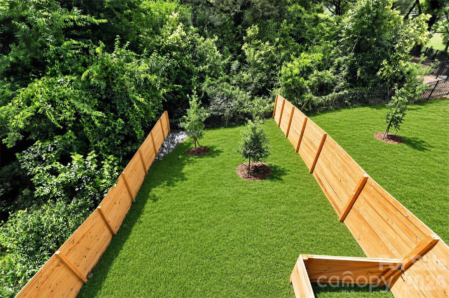 Fenced rear yard, lawn virtually enhanced Fenced rear yard, lawn virtually enhanced