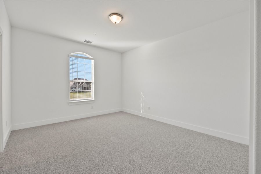 Representative unfurnished interior of a home built from the Davenport by Windsor Homes in Winding Creek, Rockwall (Image 34).