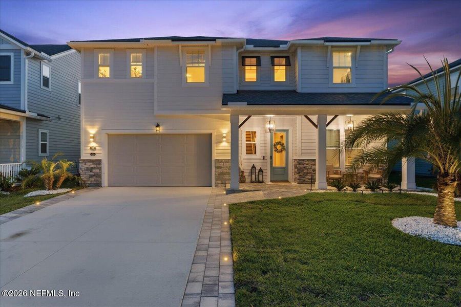 Front exterior of a new home in , St. Johns, FL, highlighting curb appeal (Image 22).