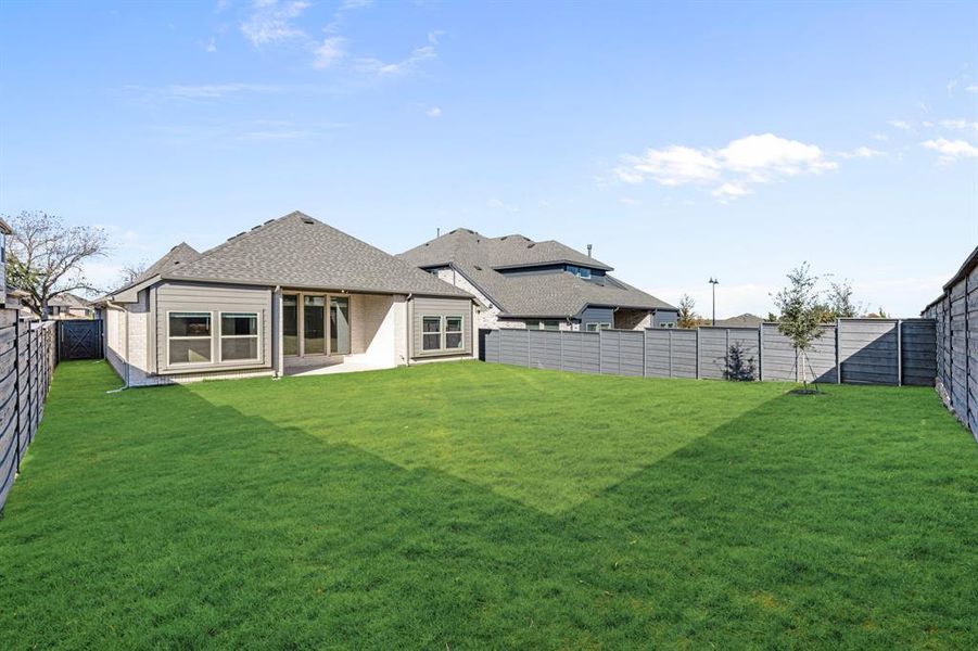 Exterior details and patio area of a home in Union Park Classic 55, Little Elm (Image 3).