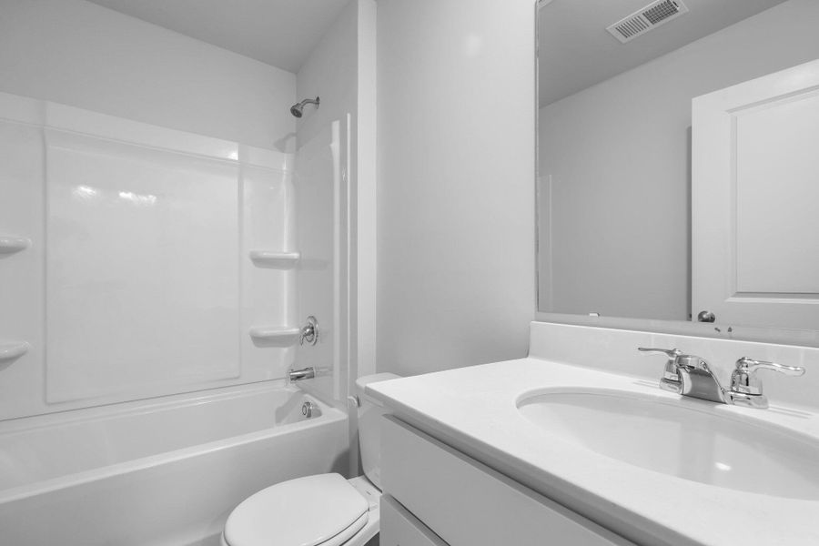 Furnished interior view inside a new home in Center Pointe, Santee (Image 6).