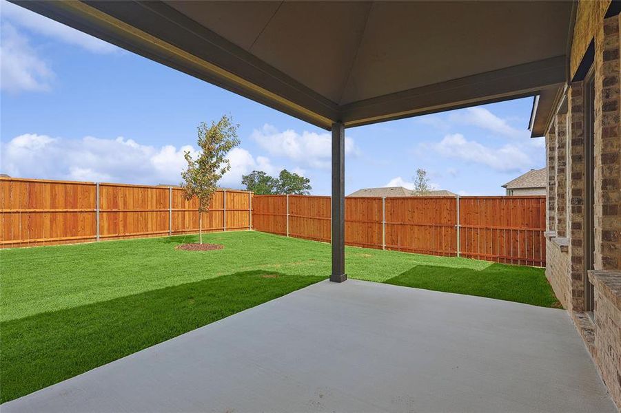 View of yard with a patio area