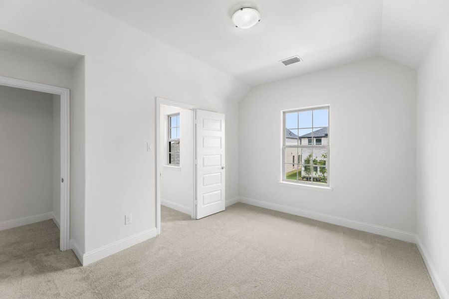 Representative unfurnished interior of a home built from the Willow by UnionMain Homes in Edgewater, Fate (Image 25).