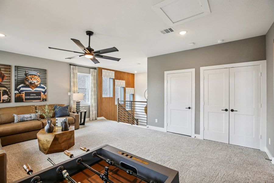 Furnished interior view inside a new home in Bridgeland, Cypress (Image 30).