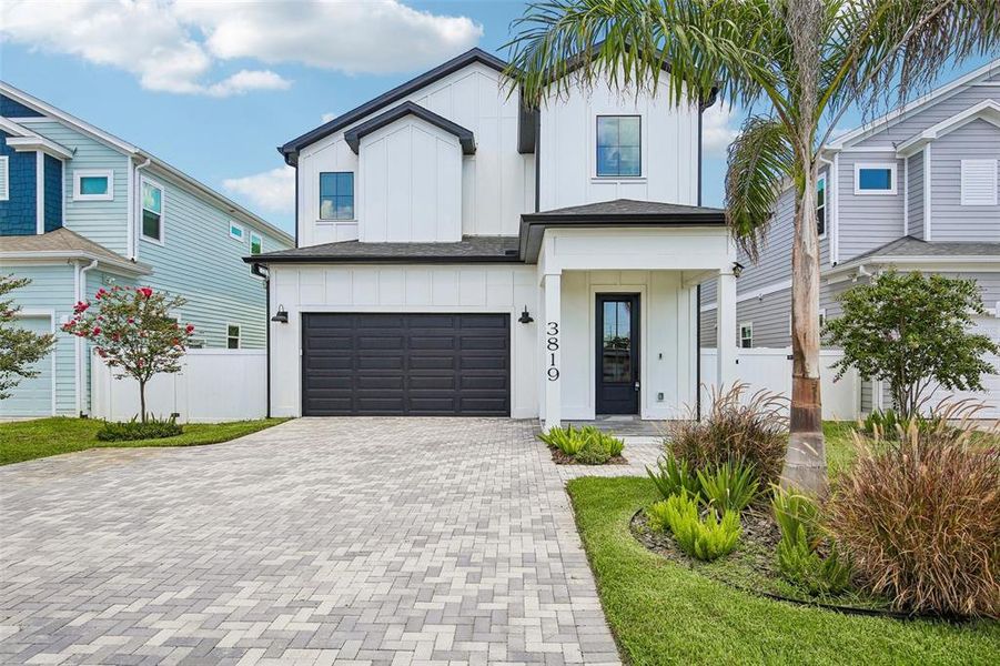 Front exterior of a new home in , St. Petersburg, FL, highlighting curb appeal (Image 25). Front exterior of a new home in , St. Petersburg, FL, highlighting curb appeal (Image 25).