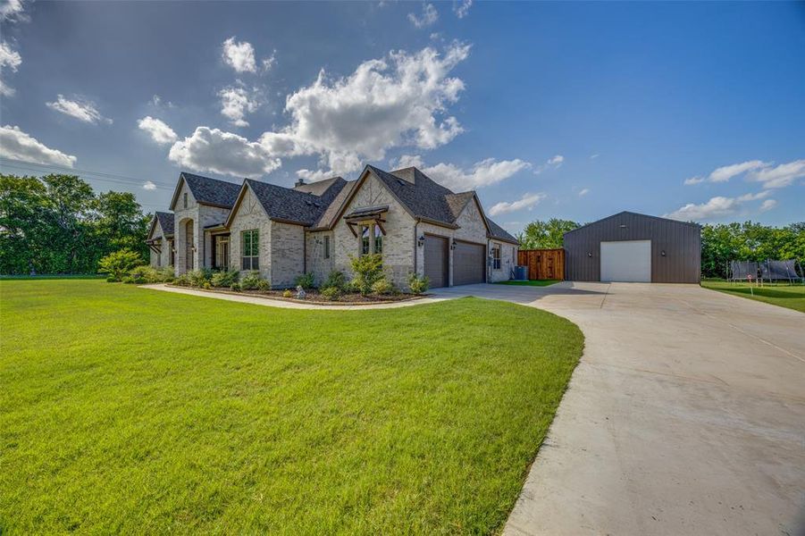 Front exterior of a new home in Error: Invalid Content, Van Alstyne, TX, highlighting curb appeal (Image 2). Front exterior of a new home in Error: Invalid Content, Van Alstyne, TX, highlighting curb appeal (Image 2).