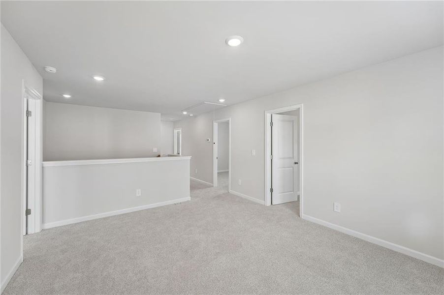 Spacious, unfurnished interior of a new home in Northwoods at Mirror Lake, Villa Rica (Image 42).