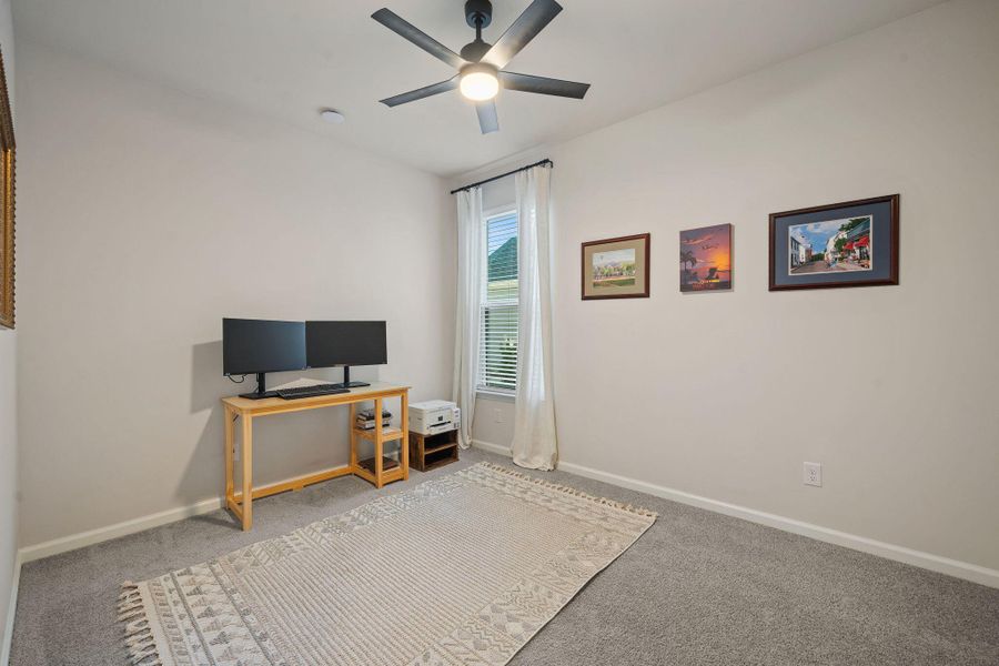 Furnished interior view inside a new home in Jasmine Point at Lakes of Cane Bay, Summerville (Image 37).