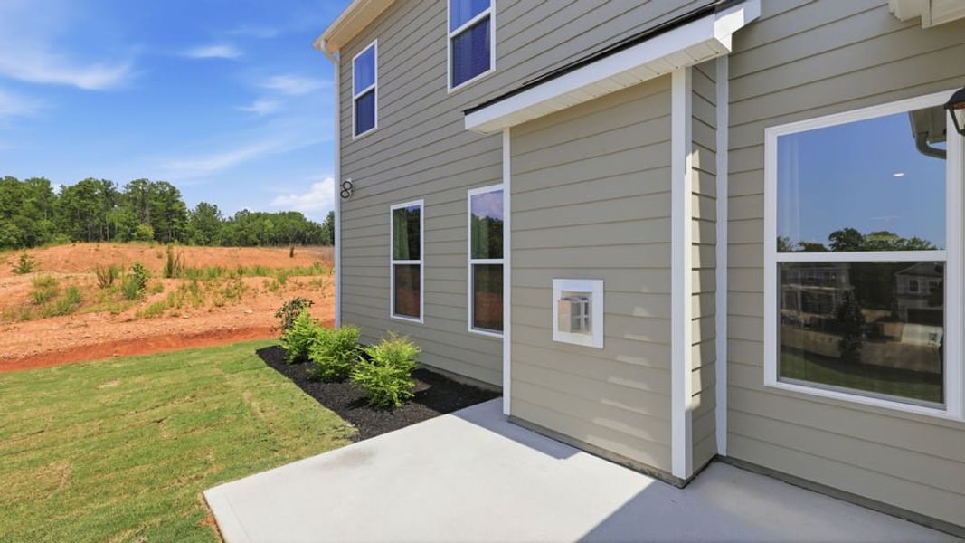 Exterior details and patio area of a home in Adams Glen, Greenville (Image 27).