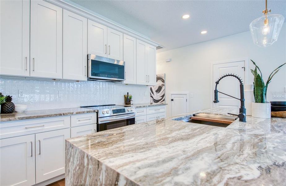 Furnished interior view inside a new home in , Palm Harbor (Image 49).