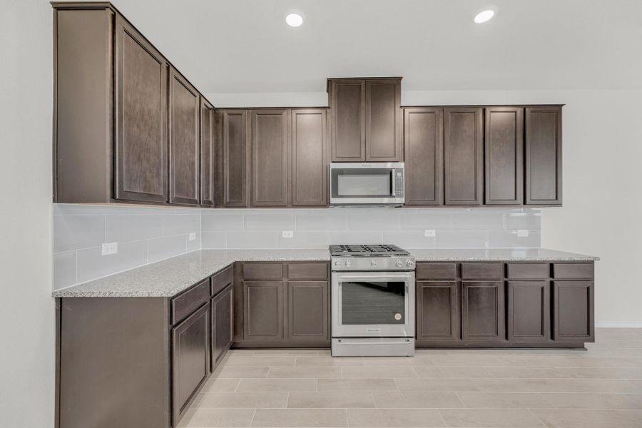 Furnished interior view inside a new home in Salerno - Classic Collection, Round Rock (Image 11). Furnished interior view inside a new home in Salerno - Classic Collection, Round Rock (Image 11).
