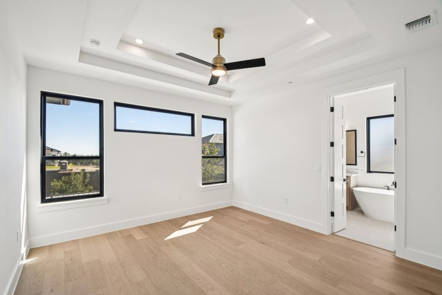 Spacious, unfurnished interior of a new home in Milky Way at River Place, Austin (Image 20).