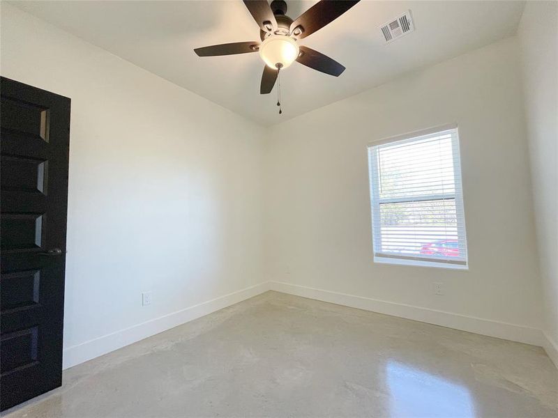 Spare room featuring ceiling fan