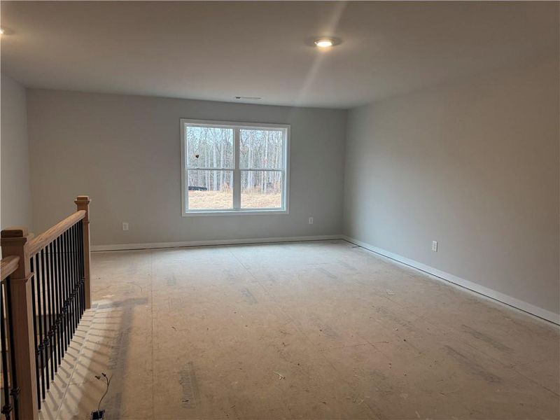 Spacious, unfurnished interior of a new home in Rosewood Lake Preserve, Hoschton (Image 9).