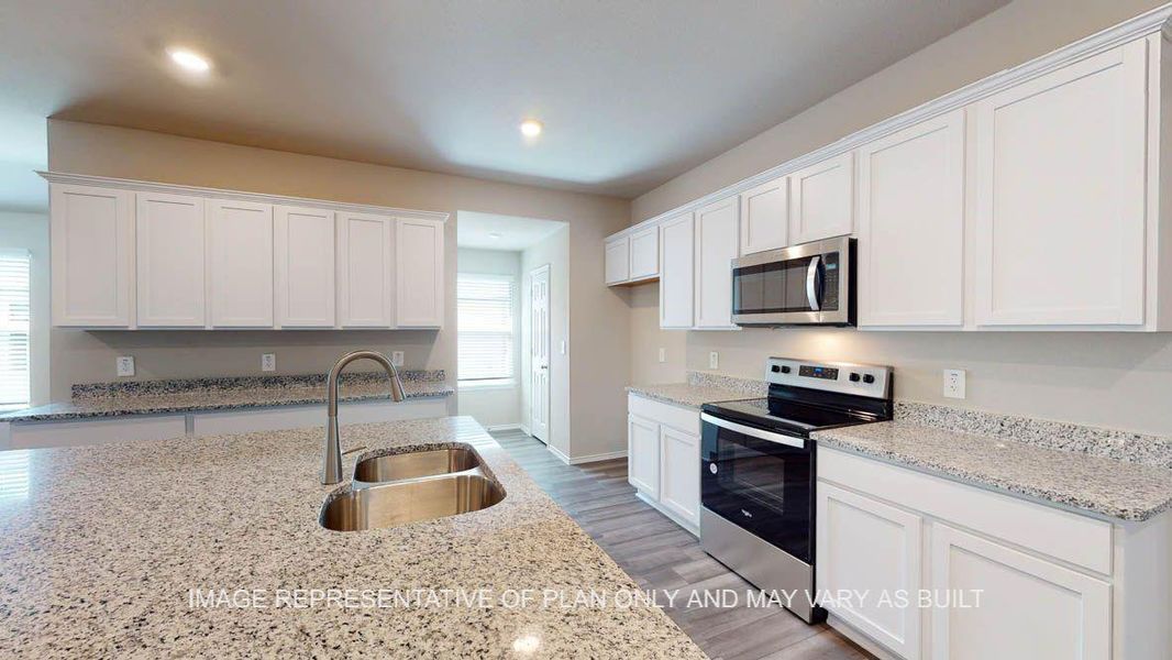 Furnished interior view inside a new home in Reserve at Mallard Lakes, Orange (Image 9).