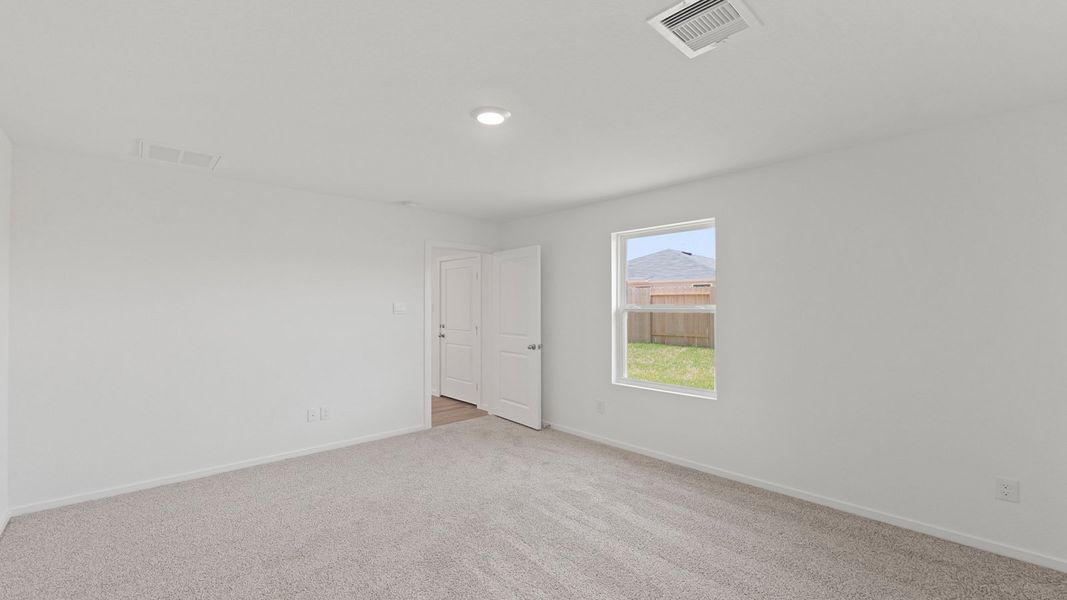 Representative unfurnished interior of a home built from the Estero by D.R. Horton in Lake Conroe Cove, Willis (Image 26). Representative unfurnished interior of a home built from the Estero by D.R. Horton in Lake Conroe Cove, Willis (Image 26).