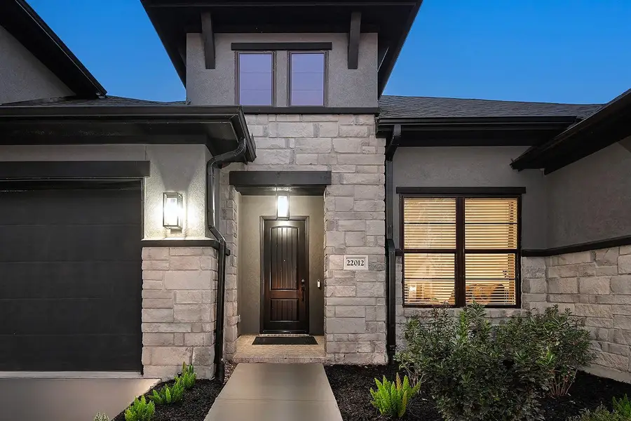 Exterior details and patio area of a home in The Highlands - 65', Porter (Image 4).