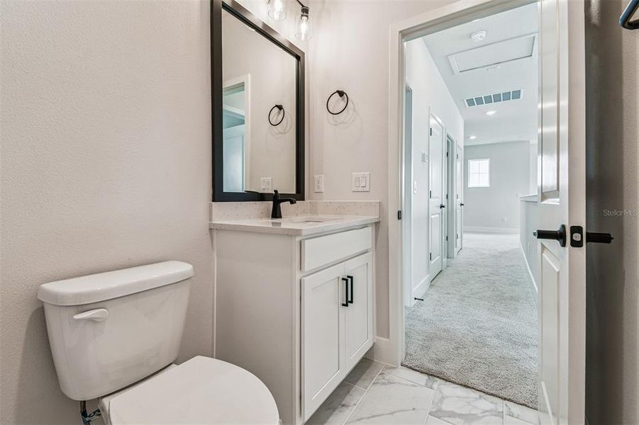 Furnished interior view inside a new home in North River Ranch – Garden Series, Parrish (Image 7).