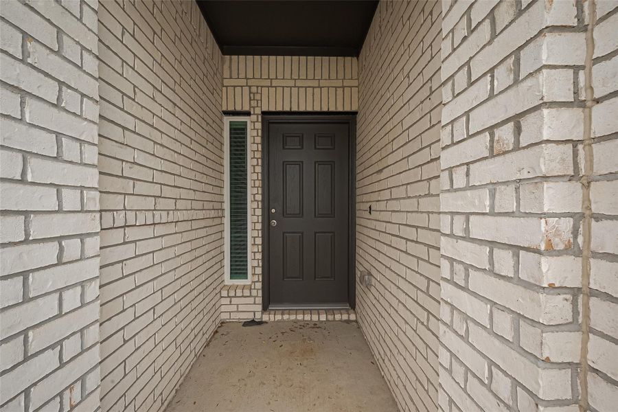 Exterior details and patio area of a home in Sunterra, Katy (Image 3). Exterior details and patio area of a home in Sunterra, Katy (Image 3).