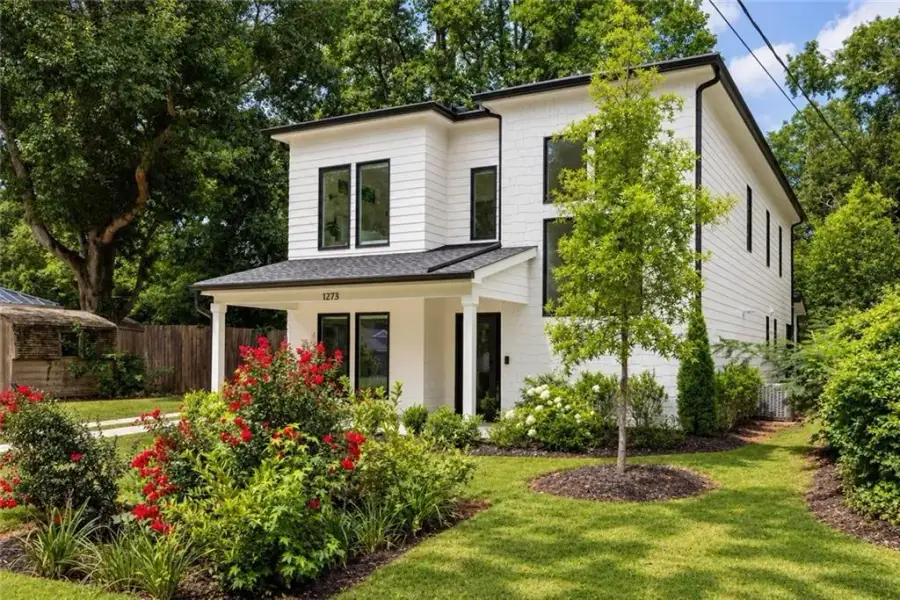 Front exterior of a new home in , Atlanta, GA, highlighting curb appeal (Image 23).